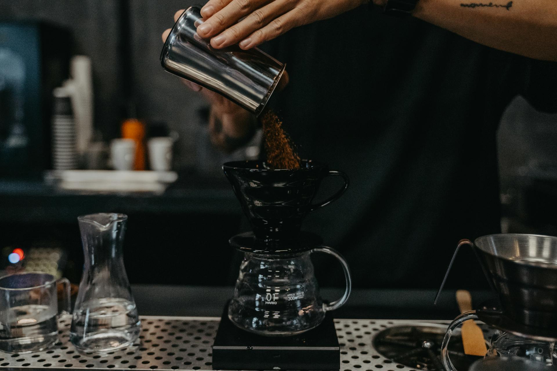 A Person Pouring Coffee