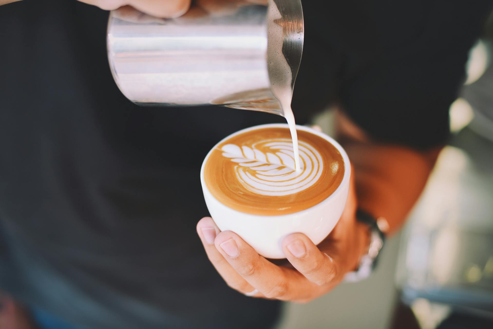 Hand Holding Cappuccino