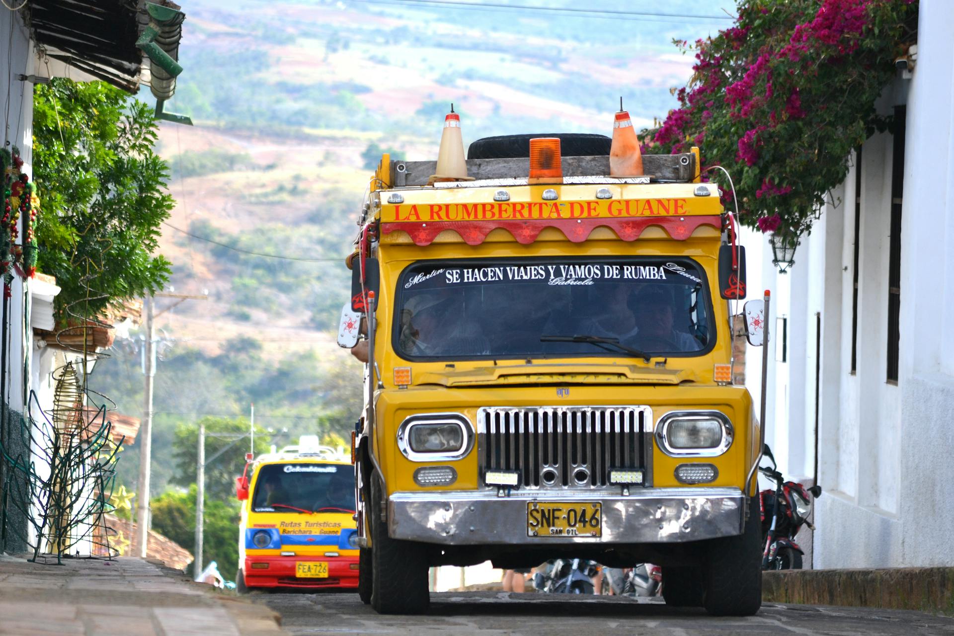 Yellow and Black Truck on Road in Colombia 