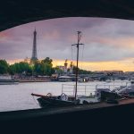 Paris from the edge of the Seine River at sunset