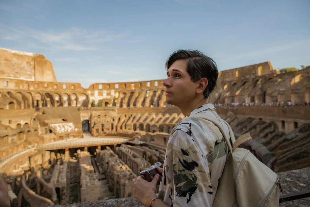 Tourist with a Camera in the Colosseum