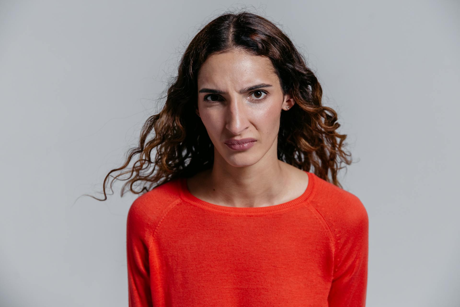 A Woman with a Disgusted Facial Expression