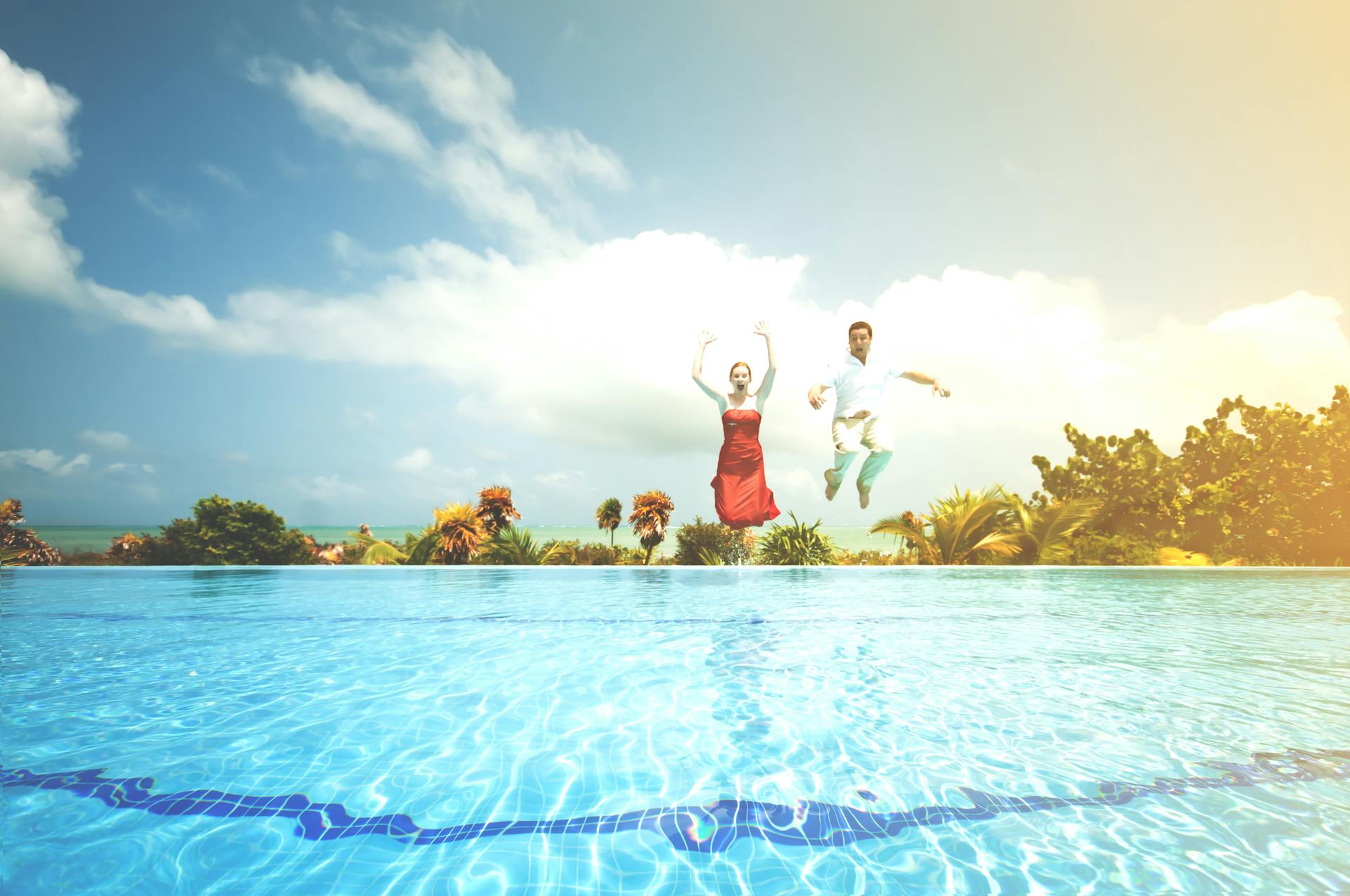 Man and Woman Jump on Water in Cancun