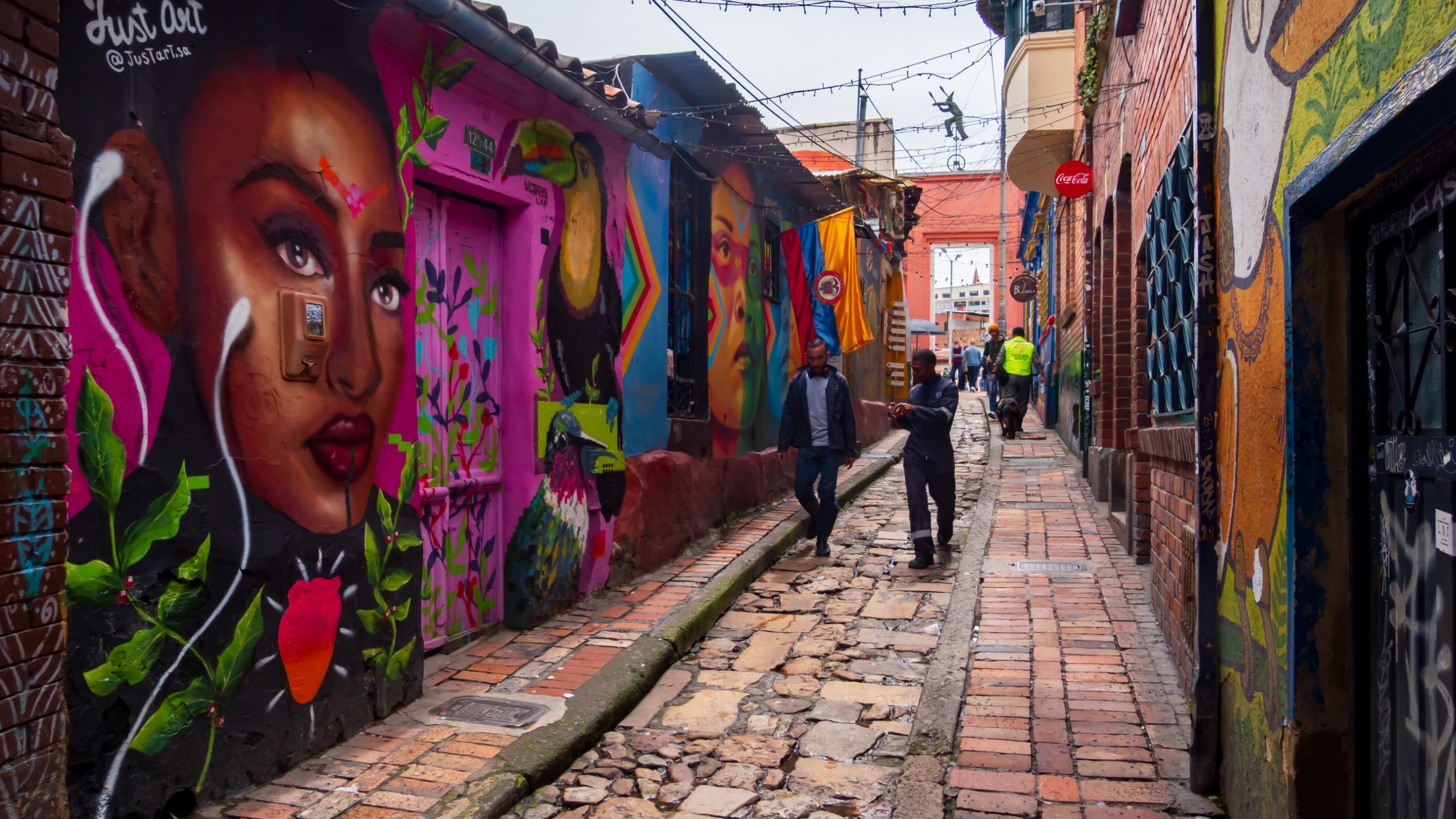 Bogota, Colombia - November 30, 2022: Colorful houses along the steep streets of Bogotá, La Candelaria district. South America