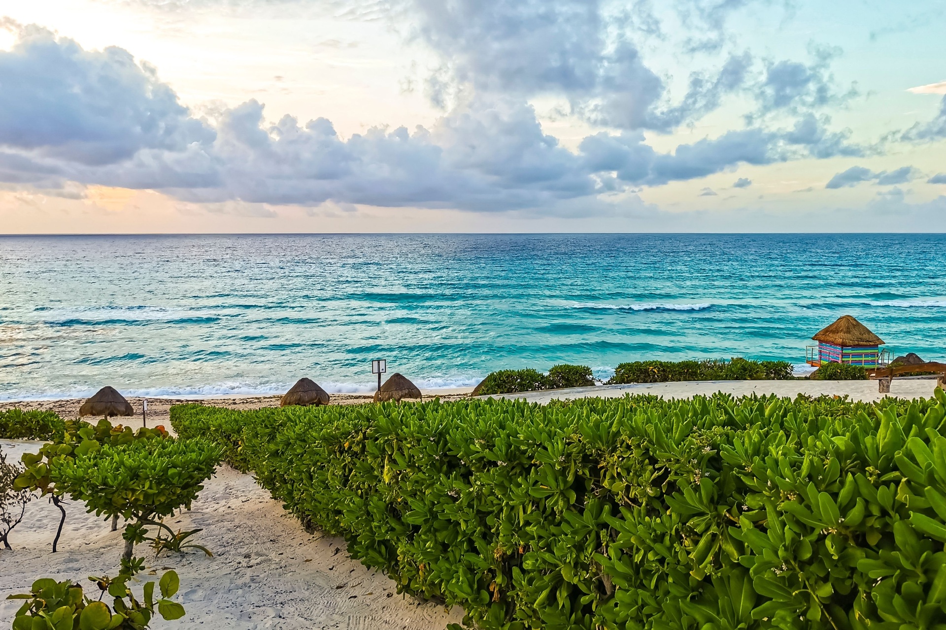 Caribbean Beach Playa Delfines with amazing sunrise in Cancun Quintana Roo Mexico.