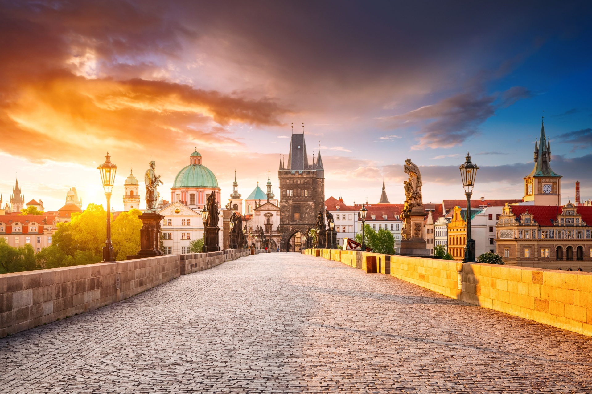 Spectacular view of the Old Town Bridge Tower from Charles bridge and Saint Francis of Assisi Church. Location place Karluv Most, Prague, Czech Republic, Europe. Discovery the beauty of earth.