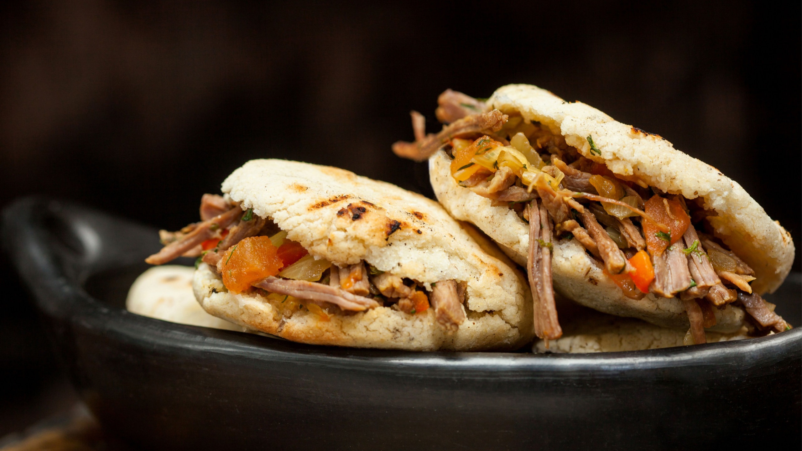 Traditional Colombian arepa filled with shredded beef
