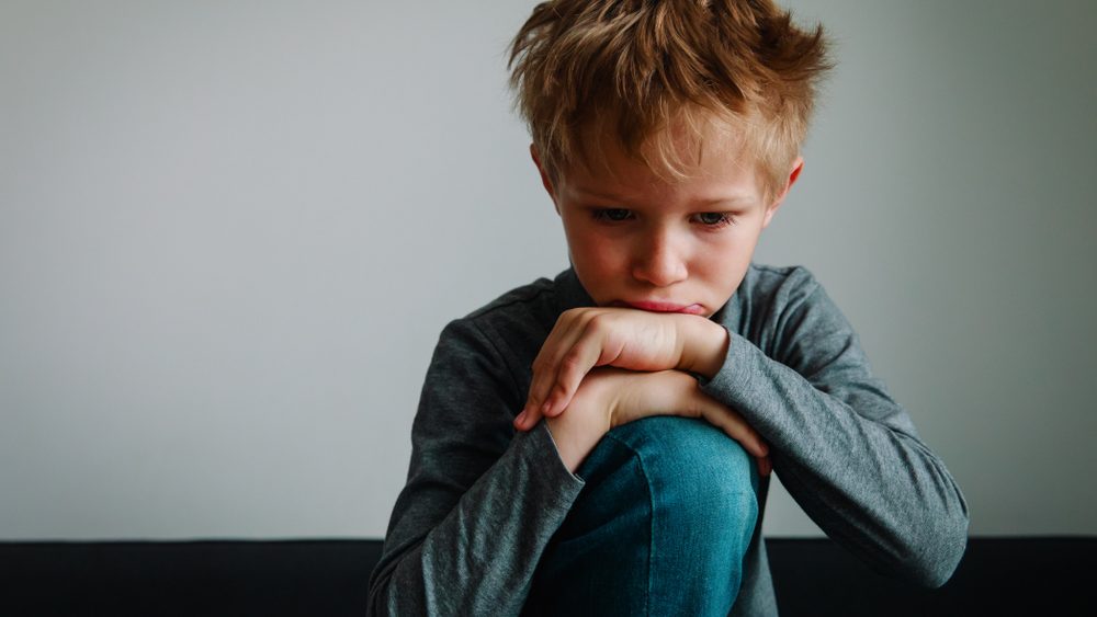 Sad child, stress and depression