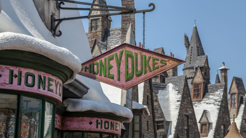 HoneyDukes, Juicy Candy Store, Hogsmeade, Diagon Alley, snow-covered architecture filled with Harry Potter movie and book stores. Food Court, Commerce