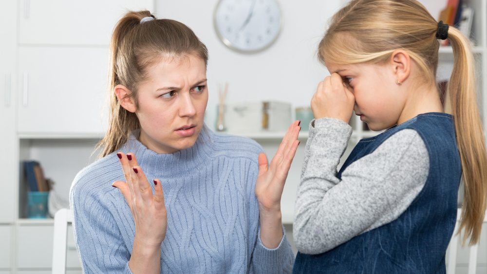 Mom scolds little daughter. Crisis of motherhood. High quality photo