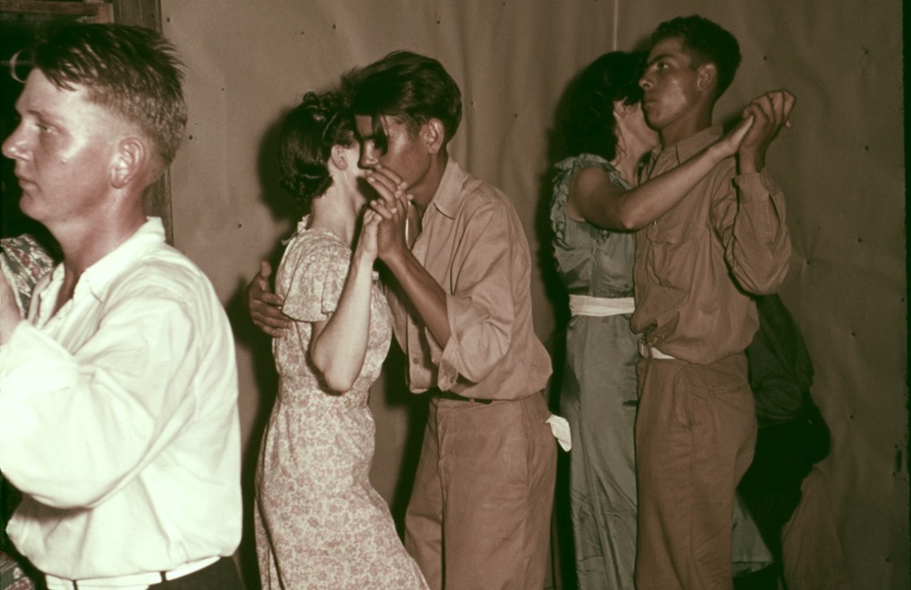 Square dance in rural home in McIntosh County Oklahoma. Ca. 1938-39.