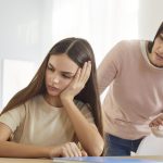 Strict mother has quarrel with her teenage daughter, lecturing her about something, arguing with silent ignoring stubborn girl, have family conflict. Children, parents and relationships concept