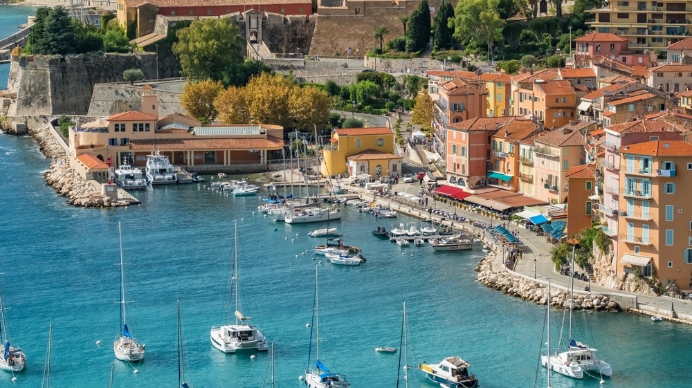 Aerial view of the picturesque town of Villefranche-sur-Mer near Nice, Cote d'Azur, southern France. A popular summer travel destination on the French Riviera.